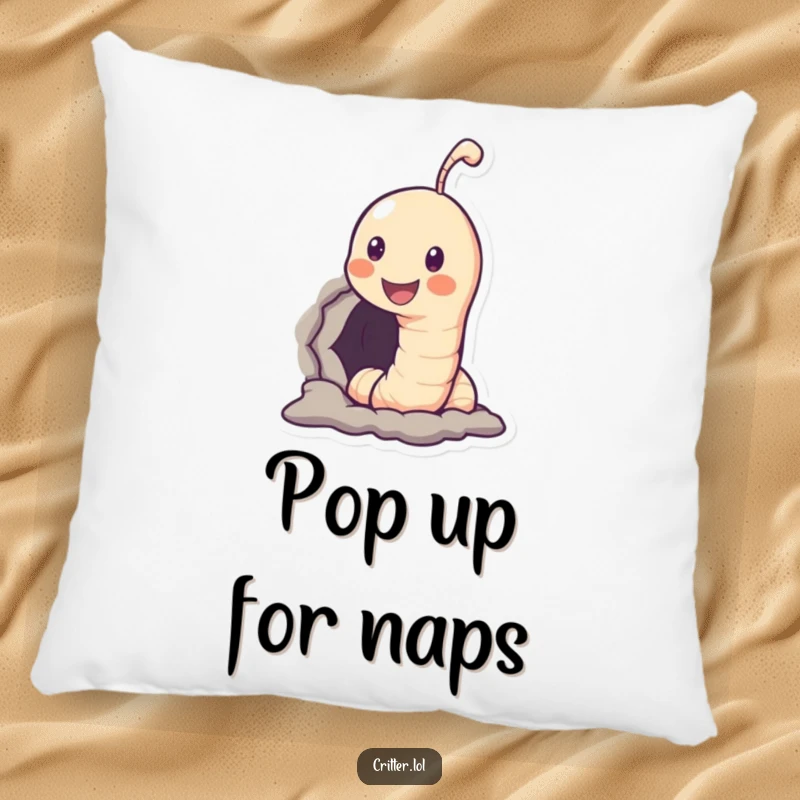 Funny pillow featuring a smiling worm character peeking out of a hole, offering comfort and a humorous, cute design.
