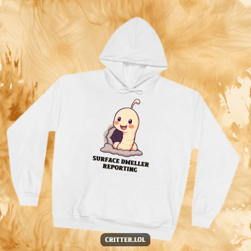 Funny hoodie featuring a smiling worm peeking out of a hole, designed for warmth and humorous relaxation.