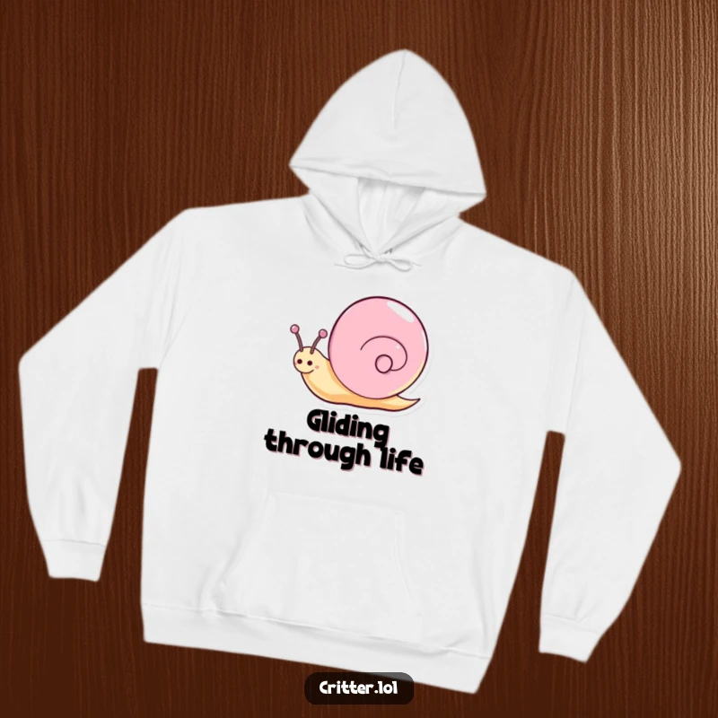 Funny snail hoodie featuring a happy character spinning with a glittery trail, offering warmth and enchantment.