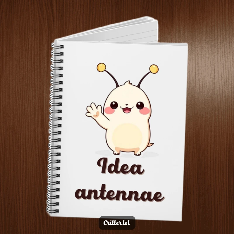 Funny alien notebook with a creature with antennae waving hello, ideal for note-taking with cosmic flair.
