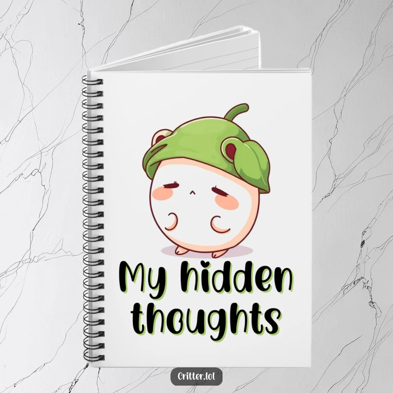 Funny notebook with a shy, round critter wearing a leaf hat and peeking out, perfect for journaling.