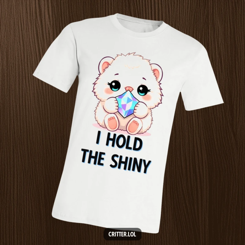 Funny t-shirt depicting a soft, fluffy creature affectionately embracing a large, dazzling gemstone, looking utterly content.