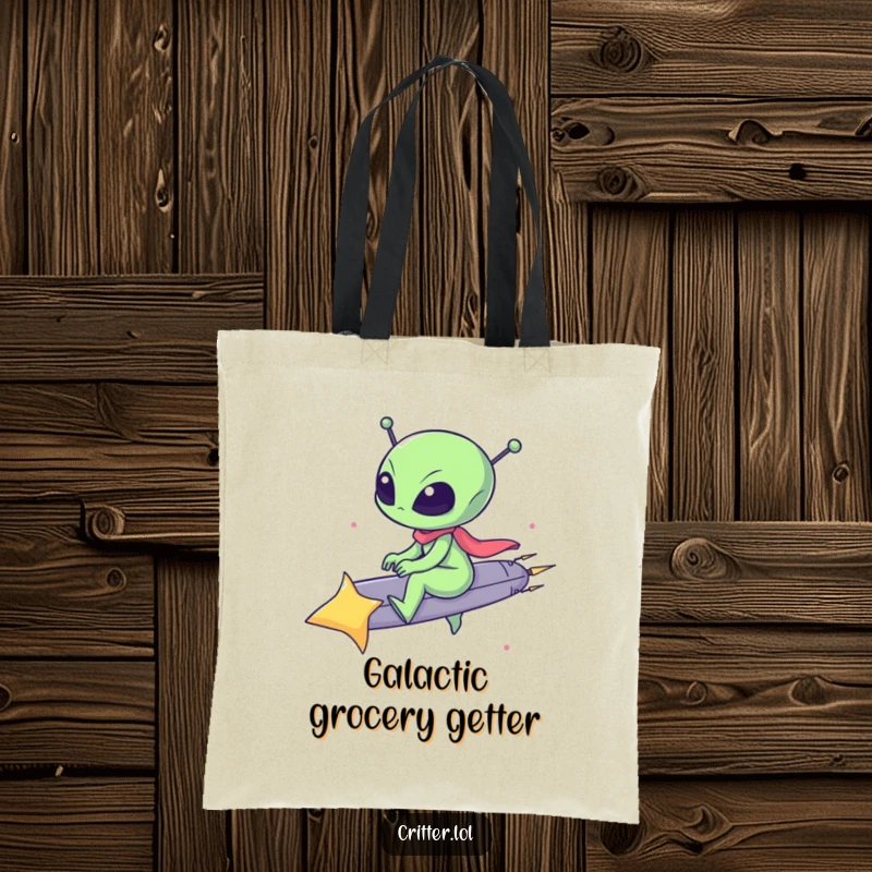 Funny tote bag showcasing a small alien gleefully riding a vibrant shooting star, ideal for everyday use and smiles.