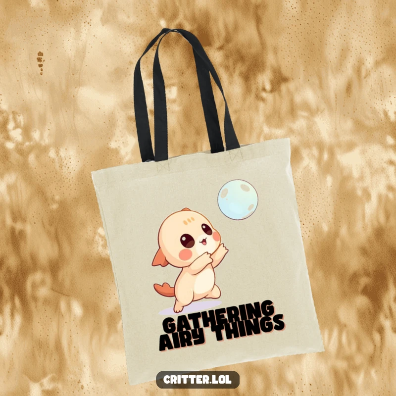 Funny tote bag featuring a playful creature character attempting to catch a delicate, floating bubble with joy.